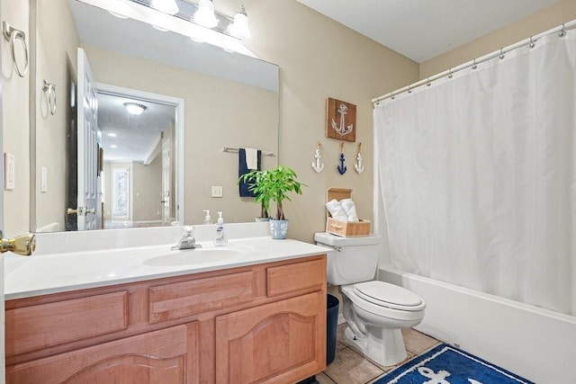 full bathroom with tile patterned flooring, vanity, shower / tub combo with curtain, and toilet