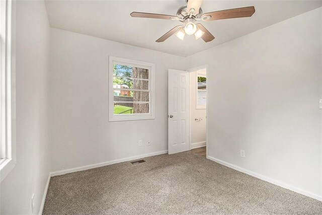 3294 Renault Rd SE, Atlanta, GA 30354 - carpeted empty room featuring baseboards and ceiling fan