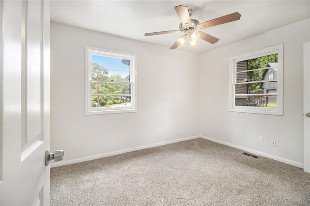 3294 Renault Rd SE, Atlanta, GA 30354 - carpeted empty room featuring baseboards and ceiling fan
