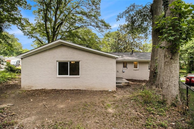 3294 Renault Rd SE, Atlanta, GA 30354 - view of home's exterior featuring brick siding and fence