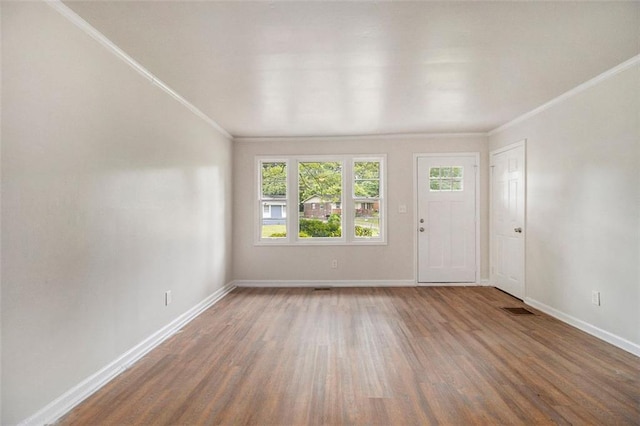 3294 Renault Rd SE, Atlanta, GA 30354 - empty room featuring crown molding, wood finished floors, and baseboards