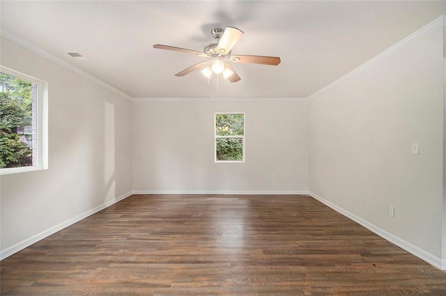 3294 Renault Rd SE, Atlanta, GA 30354 - unfurnished room featuring healthy amount of natural light, a ceiling fan, wood finished floors, baseboards, and ornamental molding