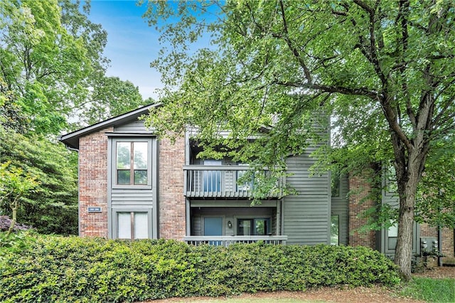 205 Tuxworth Cir Unit 205, Decatur, GA 30033 - exterior space with brick siding and a balcony