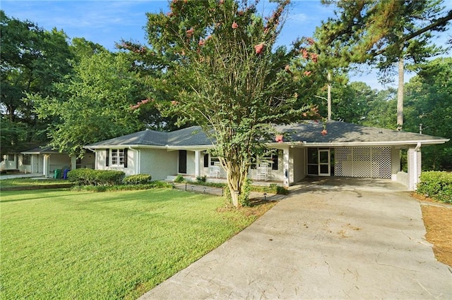 single story home featuring a carport and a front lawn