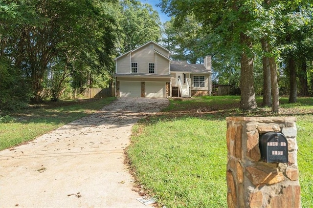 view of front facade with a front lawn and a garage