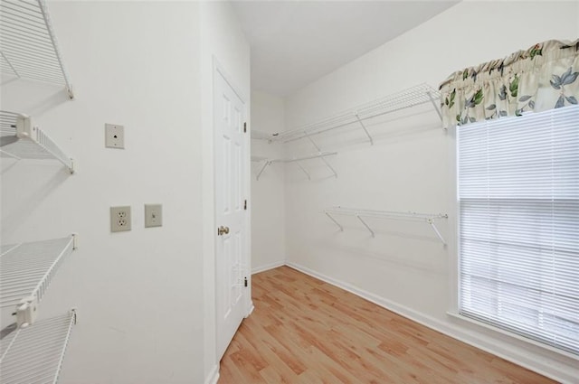 2866 Wynford Dr SW, Marietta, GA 30064 - spacious closet featuring light wood finished floors