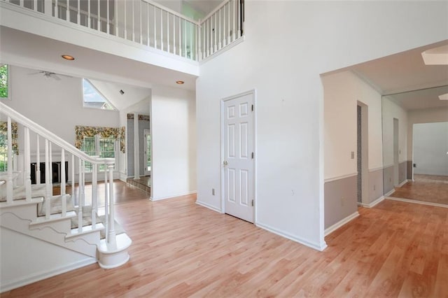 2866 Wynford Dr SW, Marietta, GA 30064 - foyer with stairway, a high ceiling, and wood finished floors