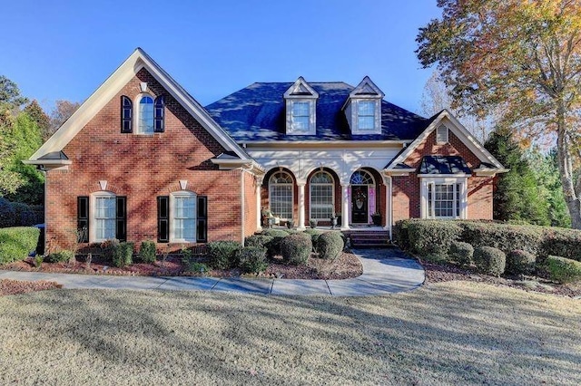 front of property featuring covered porch