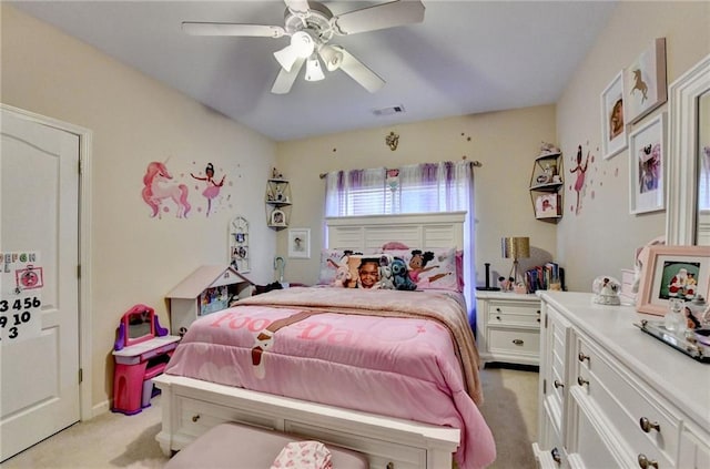 bedroom featuring ceiling fan and light colored carpet