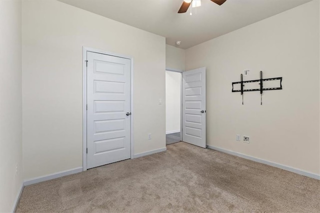 2296 Waycross Ln, Dacula, GA 30019 - unfurnished bedroom with carpet, baseboards, and ceiling fan