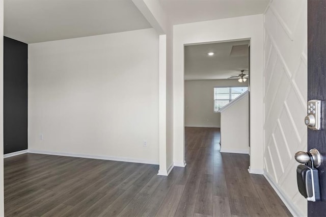 2296 Waycross Ln, Dacula, GA 30019 - foyer with a ceiling fan, dark wood-style flooring, a decorative wall, baseboards, and recessed lighting
