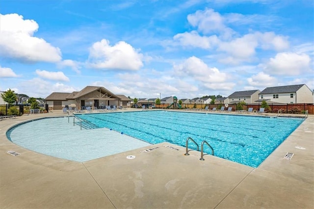 2296 Waycross Ln, Dacula, GA 30019 - community pool featuring a patio and a residential view