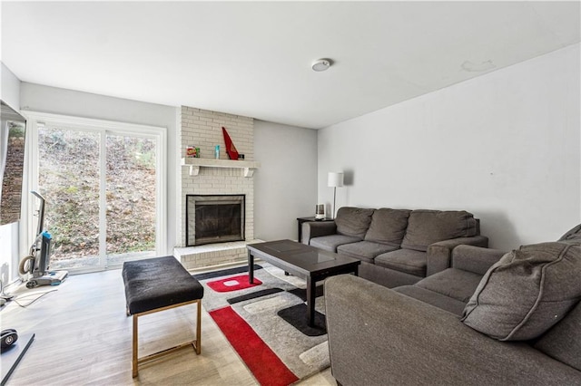 living room featuring a fireplace and hardwood / wood-style flooring