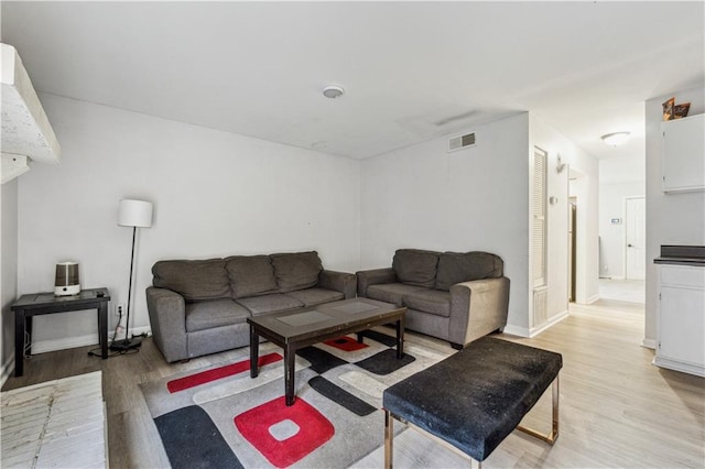 living room featuring light wood-type flooring