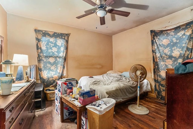 bedroom featuring hardwood / wood-style flooring and ceiling fan