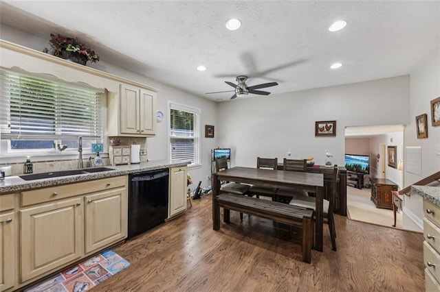 1487 W Bend Creek Ct, Atlanta, GA 30338 - kitchen with black dishwasher, a sink, light wood finished floors, cream cabinets, and ceiling fan