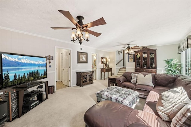 1487 W Bend Creek Ct, Atlanta, GA 30338 - living area featuring stairs, a ceiling fan, carpet flooring, and crown molding