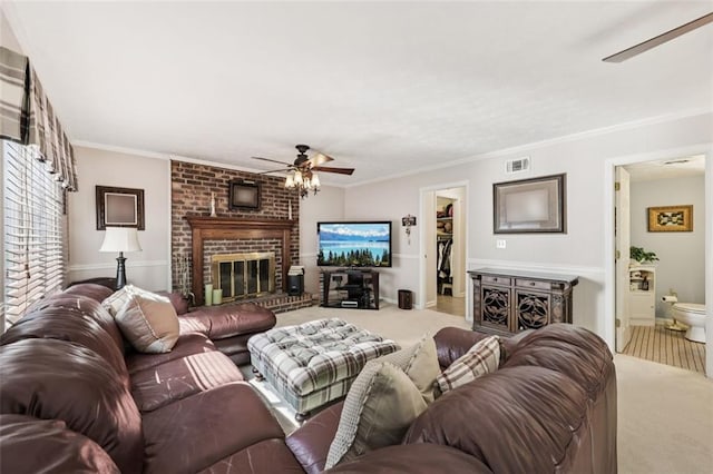 1487 W Bend Creek Ct, Atlanta, GA 30338 - living room with a ceiling fan, carpet floors, ornamental molding, and a brick fireplace