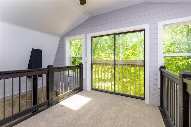 sunroom featuring lofted ceiling