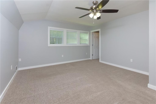 interior space with ceiling fan and vaulted ceiling