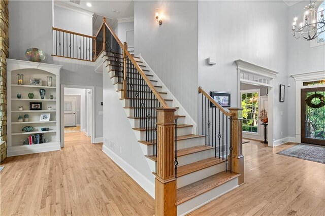 519 River Estates Parkway, Canton, GA 30115 - foyer entrance featuring stairway, wood finished floors, and a towering ceiling