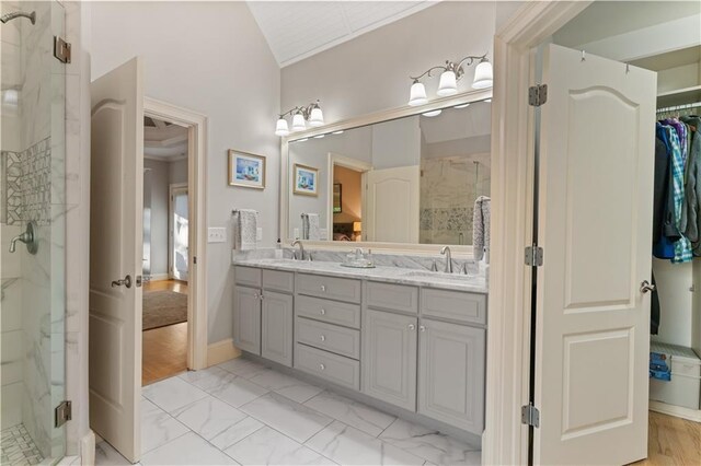 519 River Estates Parkway, Canton, GA 30115 - bathroom featuring double vanity, a marble finish shower, and a sink