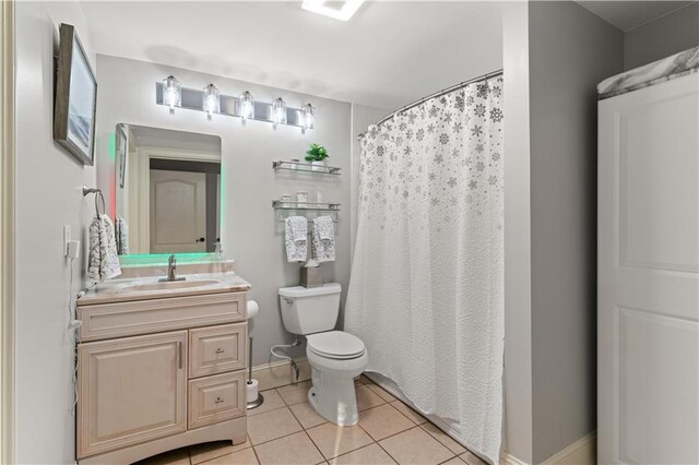 519 River Estates Parkway, Canton, GA 30115 - full bath with tile patterned flooring, vanity, toilet, a shower with shower curtain, and baseboards
