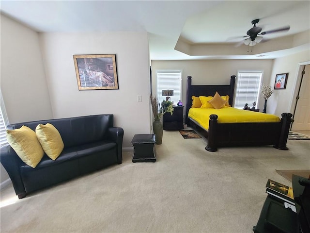 carpeted bedroom featuring a ceiling fan