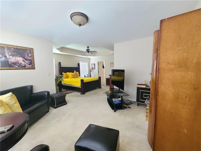 living room featuring light carpet and ceiling fan