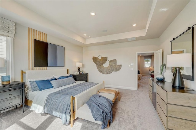82 Sheryl Way, Loganville, GA 30052 - bedroom featuring light carpet, recessed lighting, and a tray ceiling