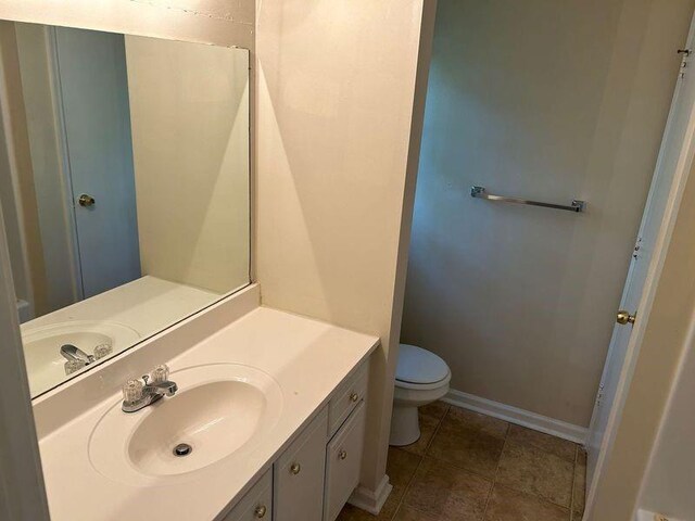 1106 Hardy Cir, Dallas, GA 30157 - bathroom featuring toilet, tile patterned floors, baseboards, and vanity