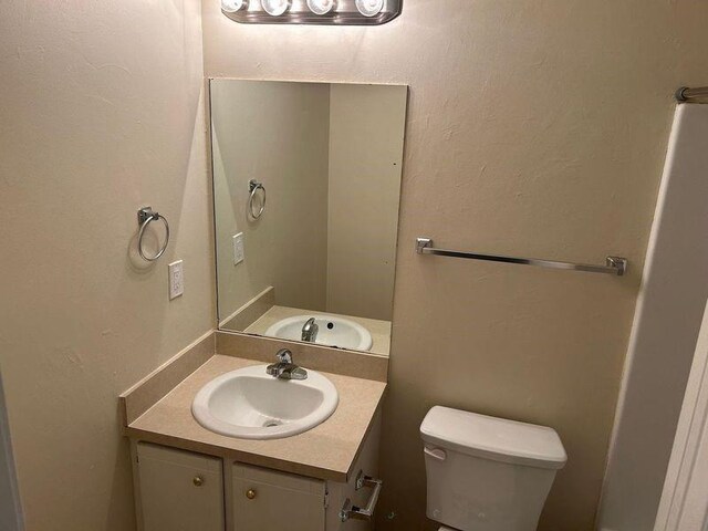 1106 Hardy Cir, Dallas, GA 30157 - bathroom featuring toilet and vanity