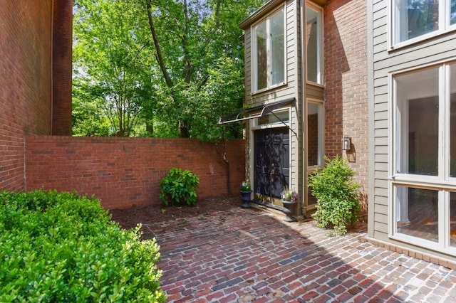 49 Willow Gln, Atlanta, GA 30342 - view of patio featuring fence