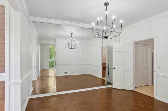 49 Willow Gln, Atlanta, GA 30342 - unfurnished dining area featuring a chandelier, crown molding, and baseboards