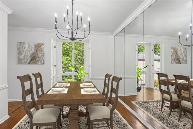 49 Willow Gln, Atlanta, GA 30342 - dining area with a chandelier, ornamental molding, wood finished floors, and baseboards