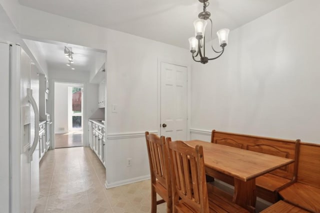 49 Willow Gln, Atlanta, GA 30342 - dining area with a chandelier