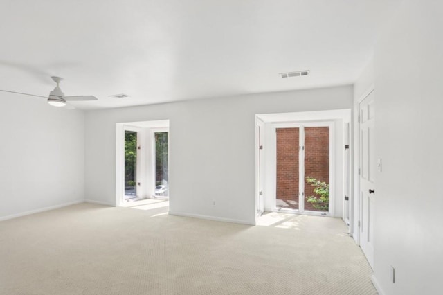 49 Willow Gln, Atlanta, GA 30342 - empty room featuring light colored carpet, baseboards, and a ceiling fan