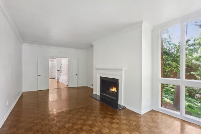 49 Willow Gln, Atlanta, GA 30342 - unfurnished living room with healthy amount of natural light, a warm lit fireplace, baseboards, and crown molding