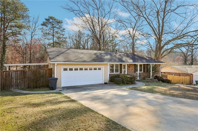 single story home featuring an attached garage, fence, concrete driveway, stucco siding, and a front yard