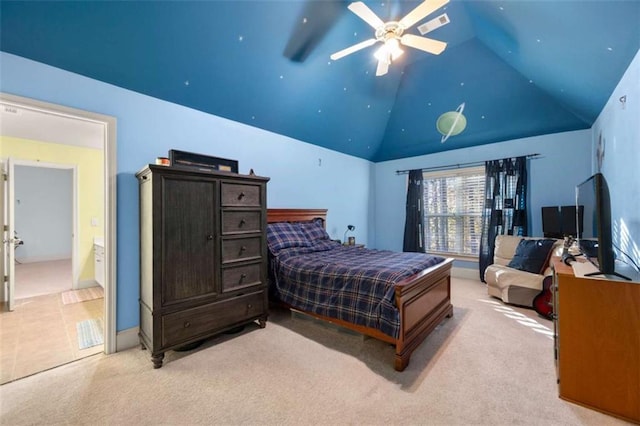 carpeted bedroom with high vaulted ceiling, ceiling fan, and connected bathroom