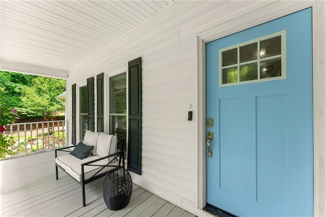entrance to property with covered porch