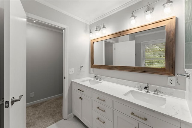 bathroom with ornamental molding and double vanity