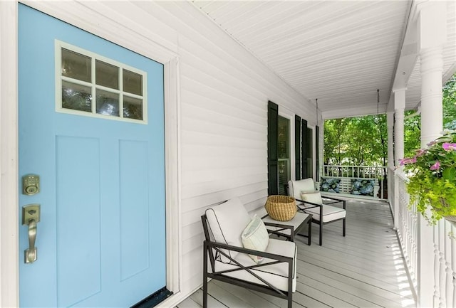 wooden deck with covered porch