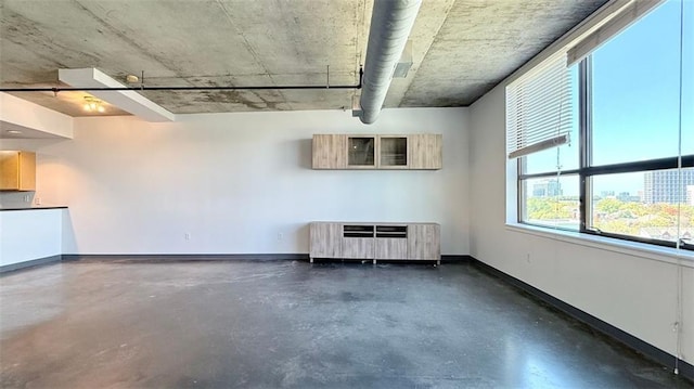 garage featuring radiator heating unit