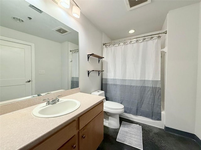 full bathroom featuring toilet, vanity, and shower / tub combo