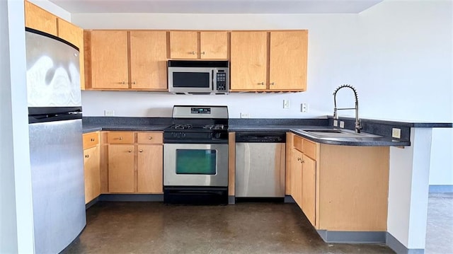 kitchen featuring light brown cabinetry, sink, appliances with stainless steel finishes, and kitchen peninsula