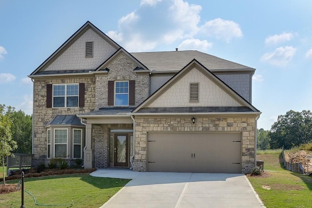 craftsman-style house with a front yard and a garage