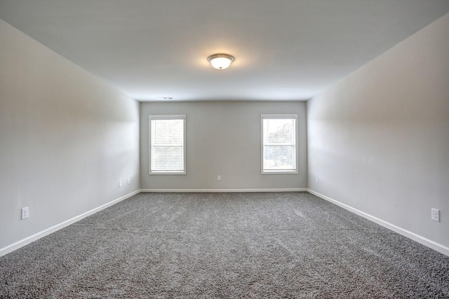 empty room featuring carpet flooring