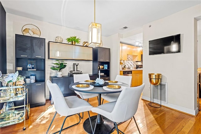 dining area featuring light hardwood / wood-style flooring