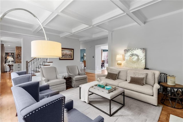living room with wood finished floors, beamed ceiling, baseboards, stairway, and coffered ceiling